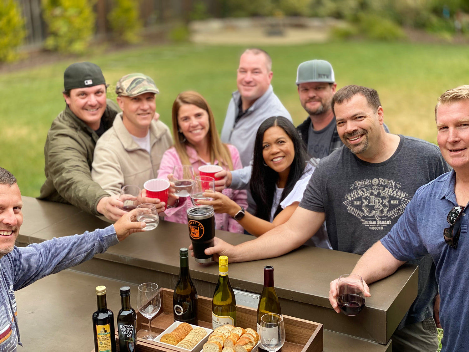 BumperBar Partygoers, Cheers Over Top Shelf BumperBar with Wine and Cheese